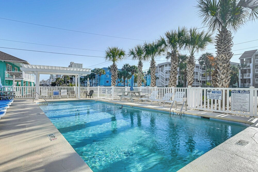 Steps to Sand: Chic Couples Garden City Retreat
