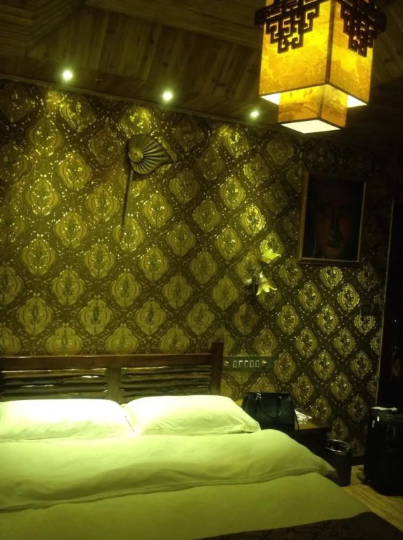 Xishuangbanna Fengweizhu Inn