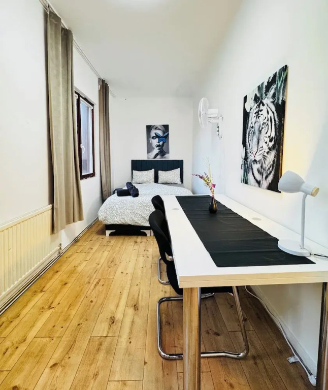 Central 8BR Stay with Garden and Terrace