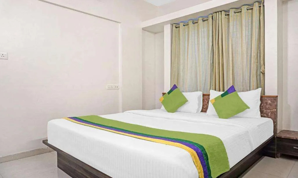 Treebo Diamond Residency - DDPK Inn
