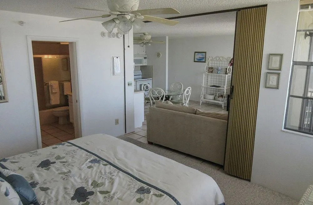 Estero Beach & Tennis #1108A by RedAwning