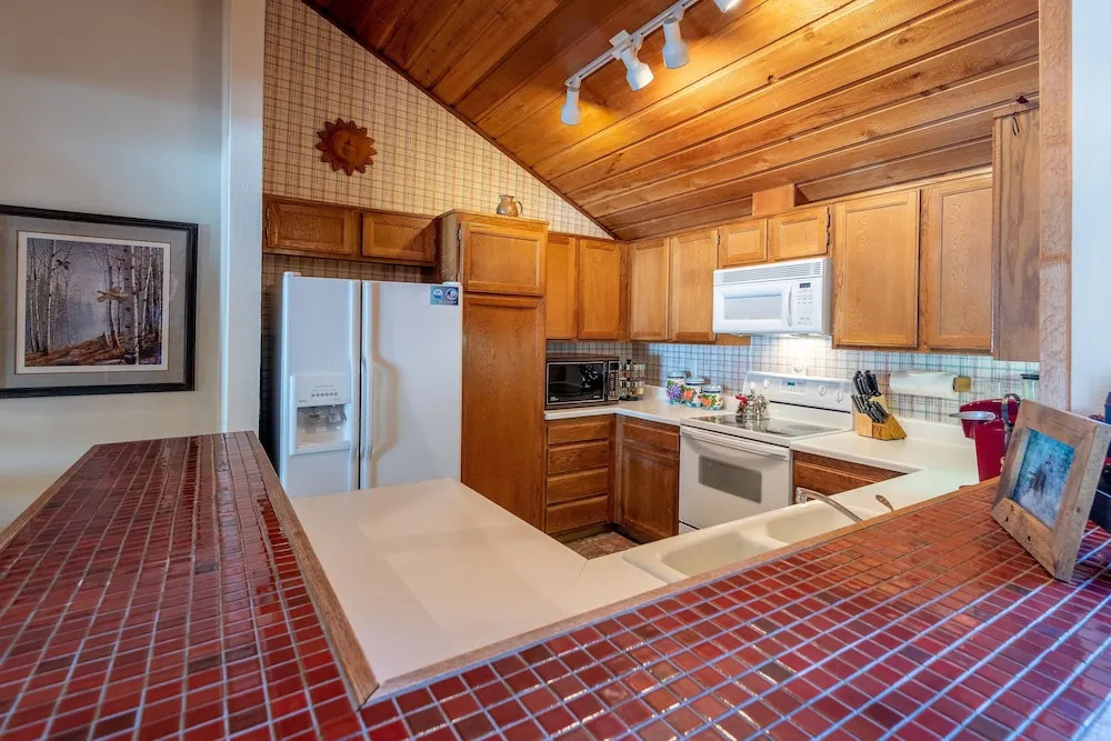 Sunburst Condominiums 2749 by RedAwning