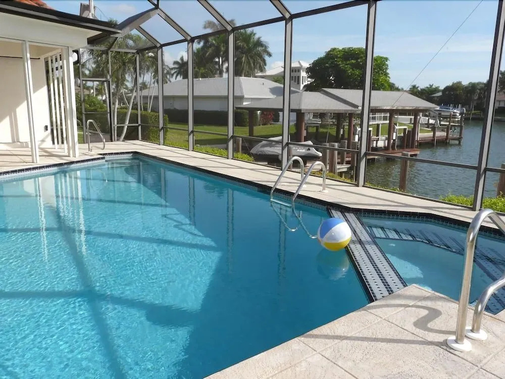 Unique waterfront home with pool, spa and guesthouse