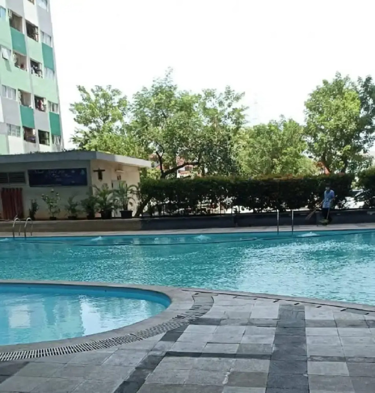 THE ROOMOS Hotel Apartemen