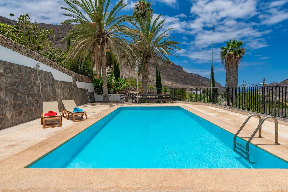 Casa de vacaciones con piscina compartida en Mogán II