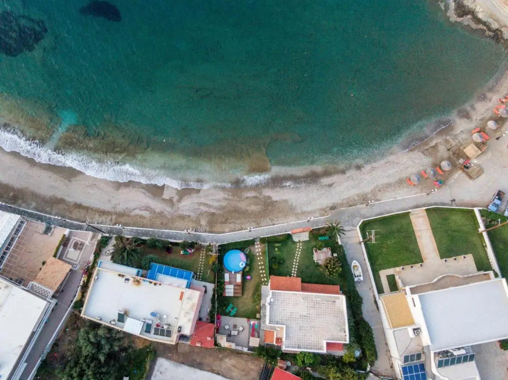 Beach front apartment with swimming pool