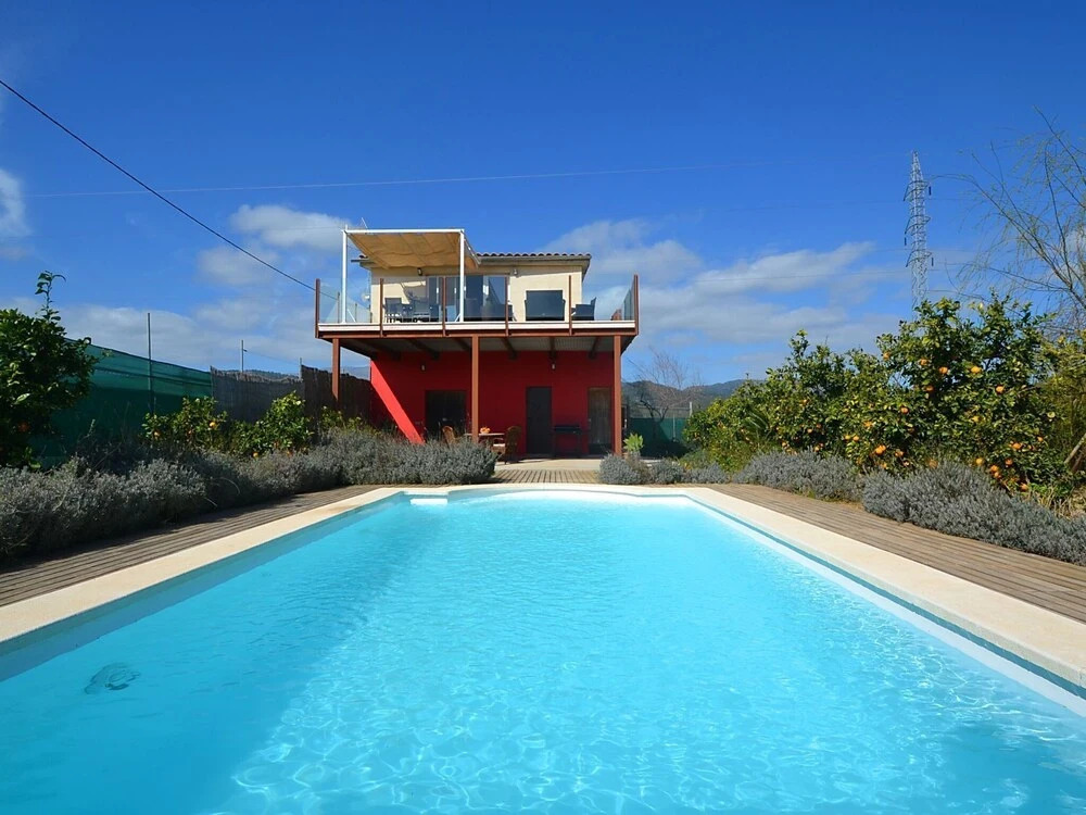 Modern Country House with Private Pool Located in An Orange Field