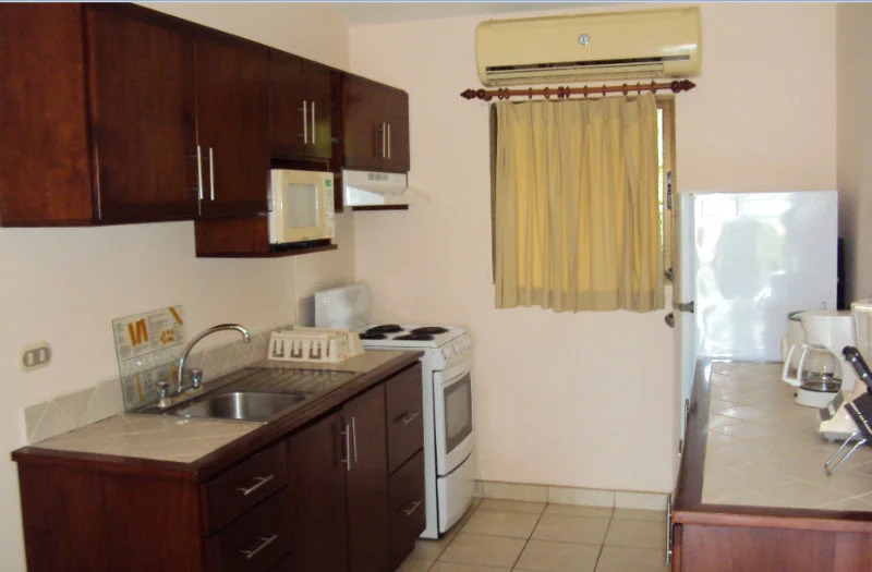 Tropical Gardens - Suites and Apartments