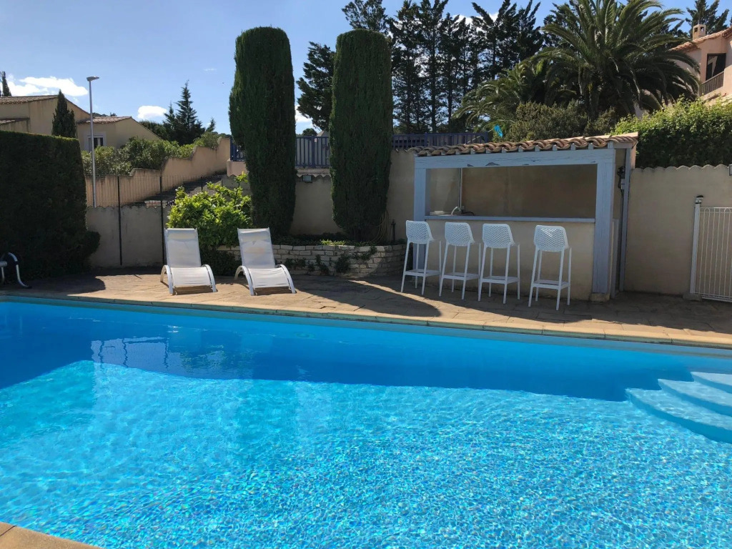 Holiday villa near Narbonne-Plage, fenced private swimming pool and view of a lake
