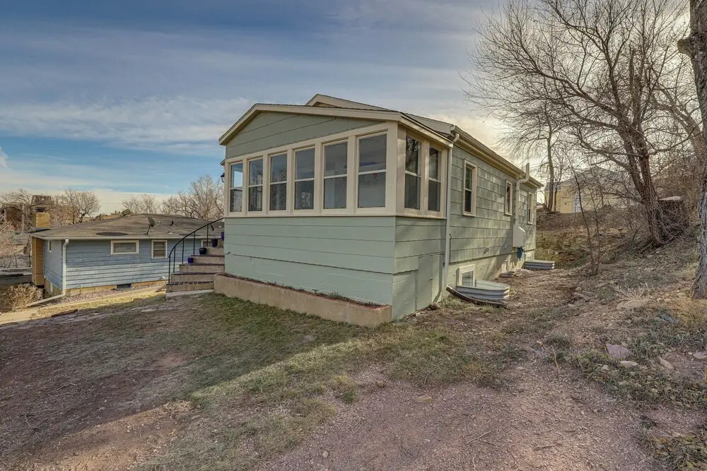Central Rapid City Home w/ Sunroom & Fireplace!