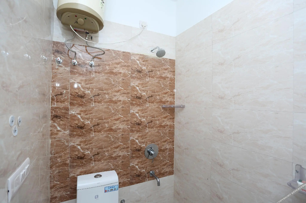OYO Flagship 12081 Palm Garden Suites