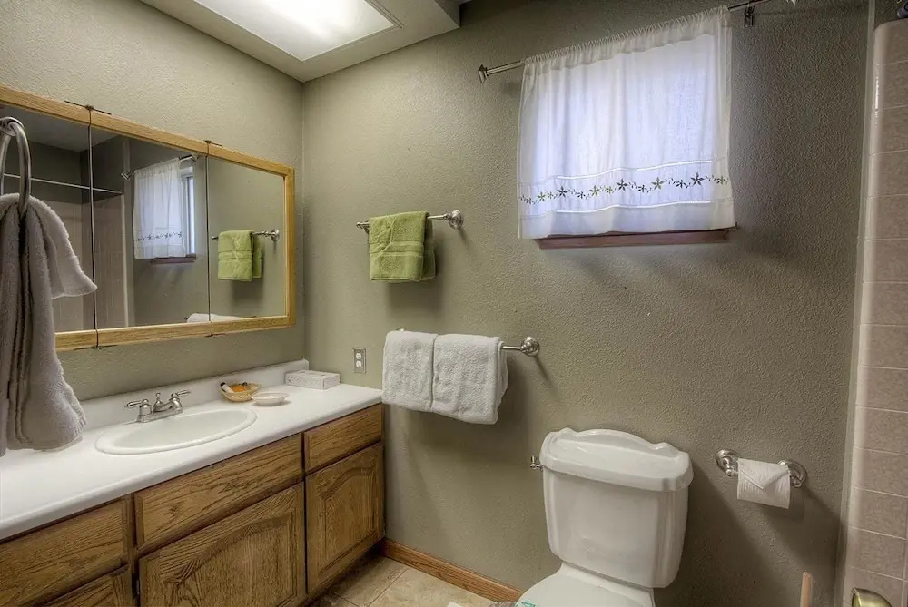 Remodeled Gambrel Style Home with Trees Views by RedAwning