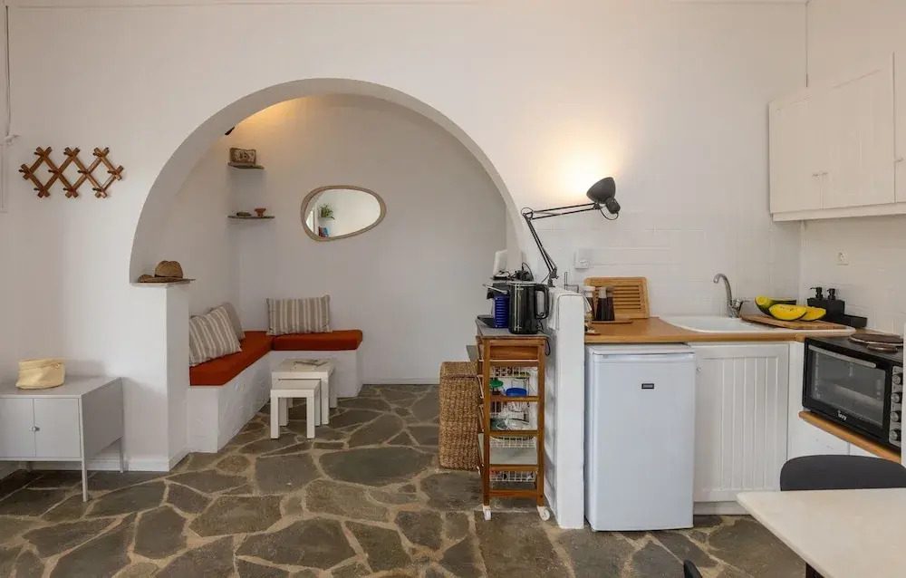 By The Stone Tinos