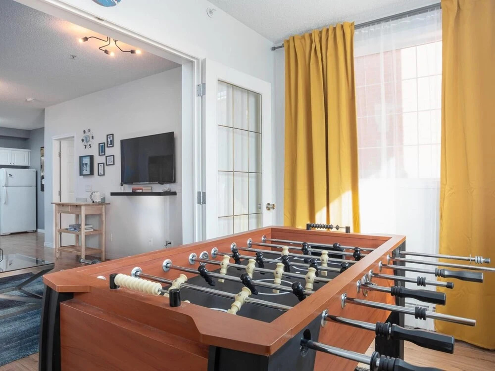 Fun and Colourful Condo w Foosball Parking Coffee