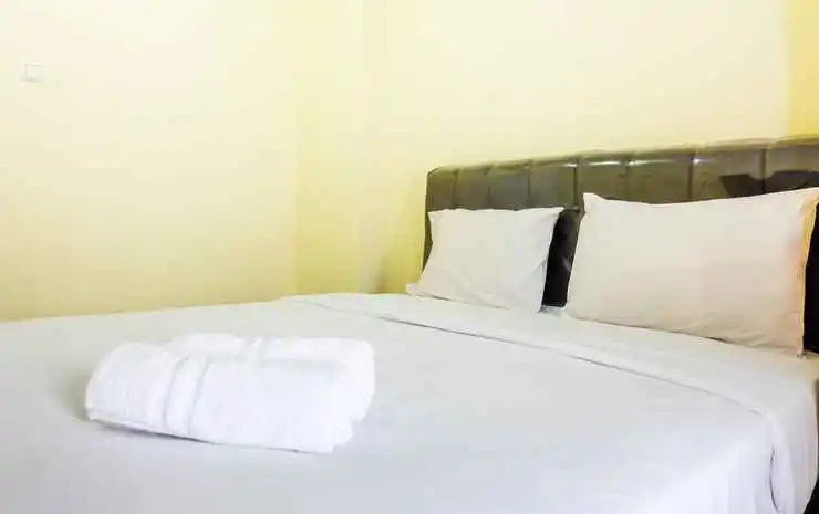 Compact and Cozy Studio Apartment Green Pramuka City By Travelio
