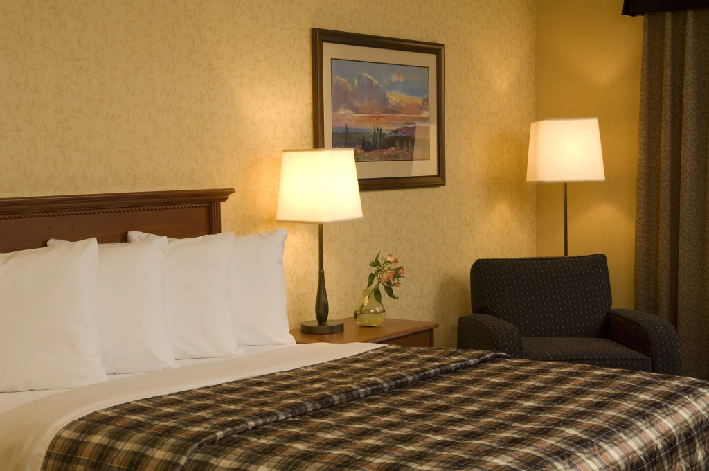 Merit Hotel & Suites