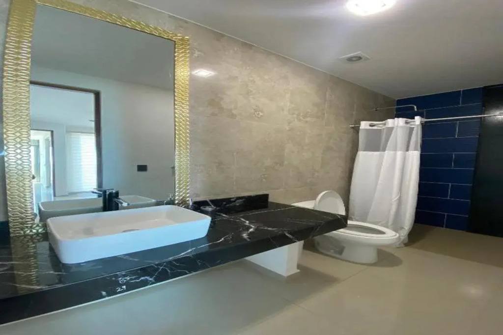 Angelina 28 Beachfront and Family Apartments - Modern and Relaxing Long Stays - 20 min from Cancun Airport