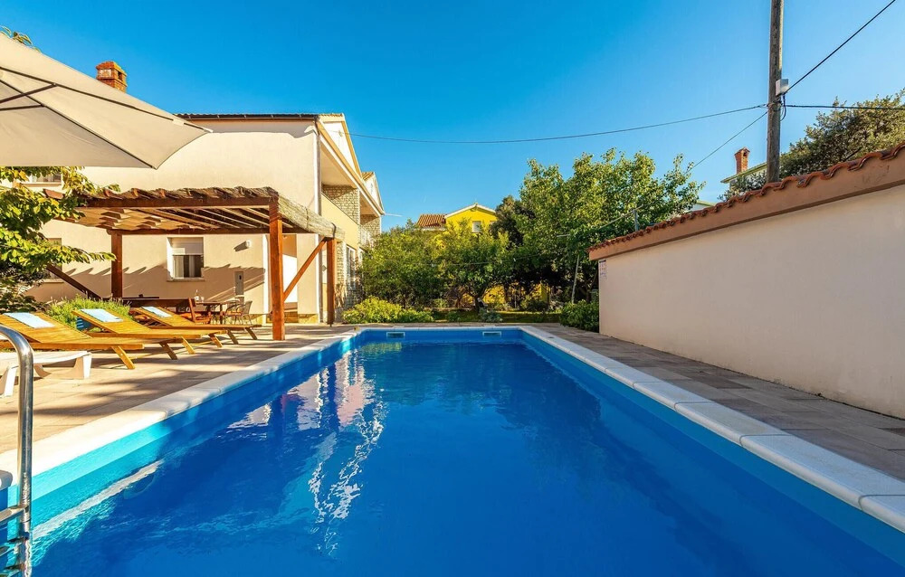 Four-Bedroom Holiday Home In Vrsi