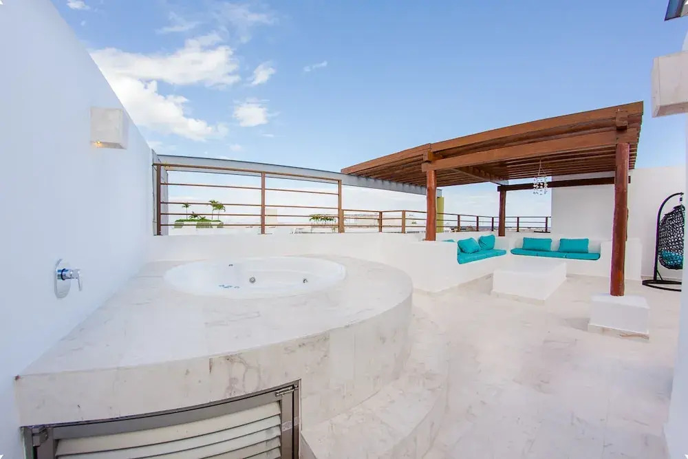 Fun and Relaxing  2BR PH steps away from the beach by Happy Address
