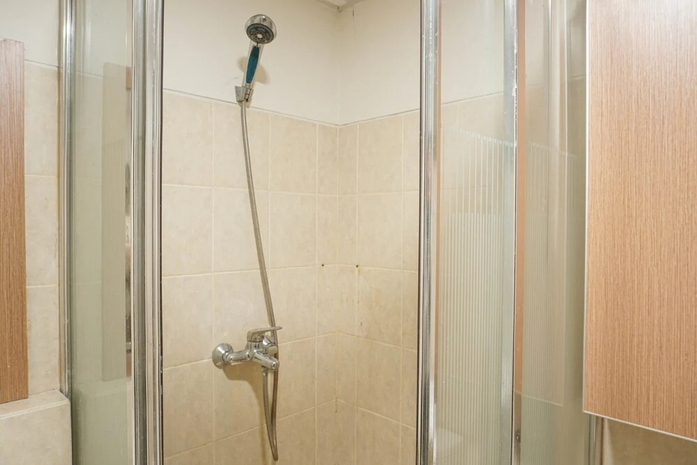 Strategic Location 1BR The Wave Apartment with City View