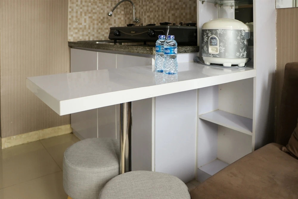 Homey And Cozy Stay 2Br At Green Pramuka City Apartment