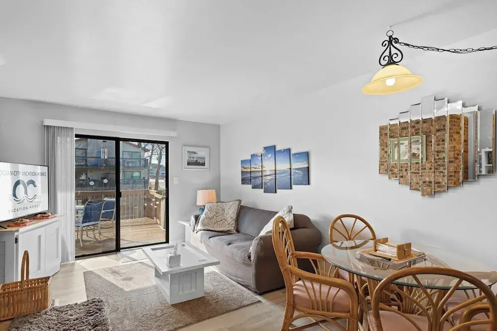 Rustic Harbor I Canal-front 3BR Condo, Private Deck & Fenced Yard