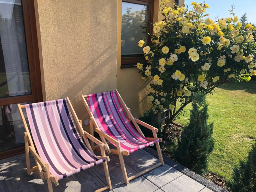 Half of holiday home, terrace, playground