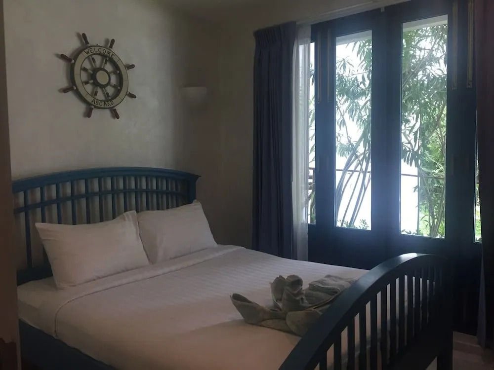The Che Pool Access Beachfront Condo by Away
