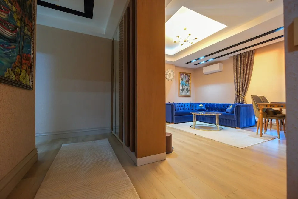 Отель Elysium Deluxe Suites