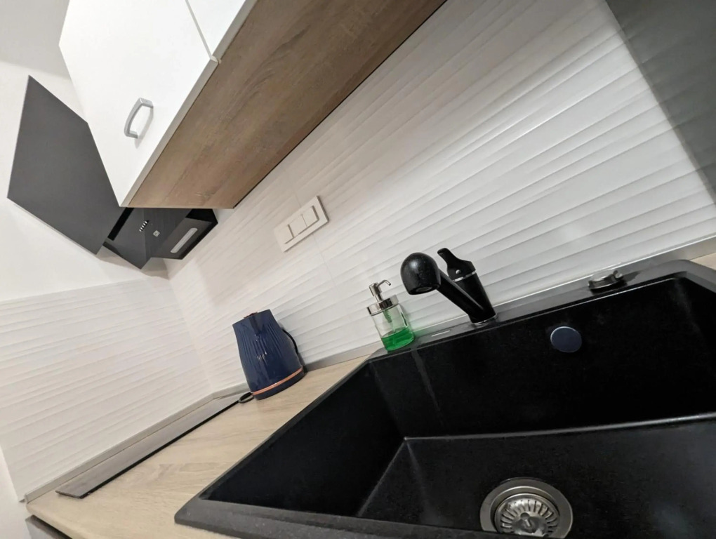 Chic Modern Studio in Historic Building w Floor Heating, 65" TV, Washer and Dryer