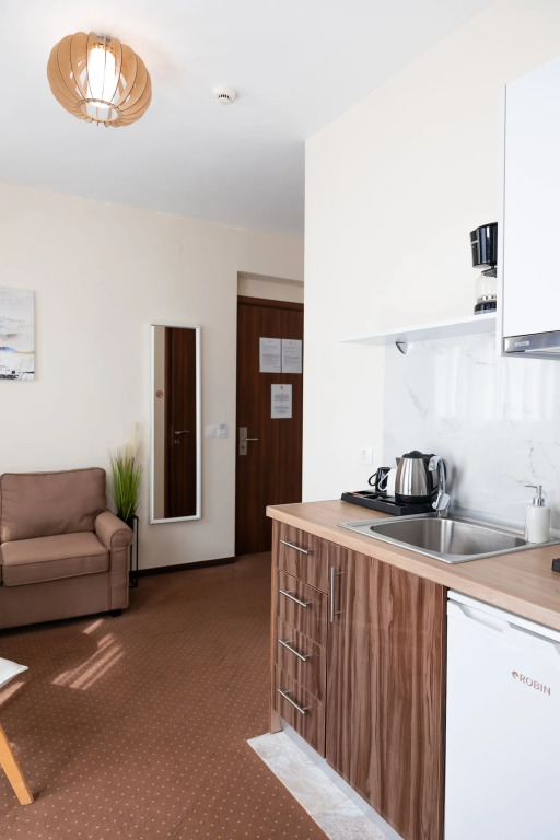 City Plaza Apartments & Rooms