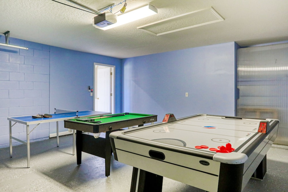 Stylish Retreat With a Private, Heated Pool, Central AC, & Garage Game Room