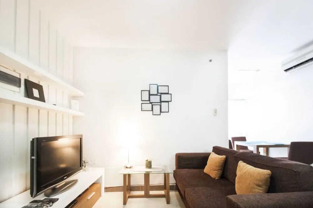2BR Cozy at Empyreal Epicentrum Apartment By Travelio