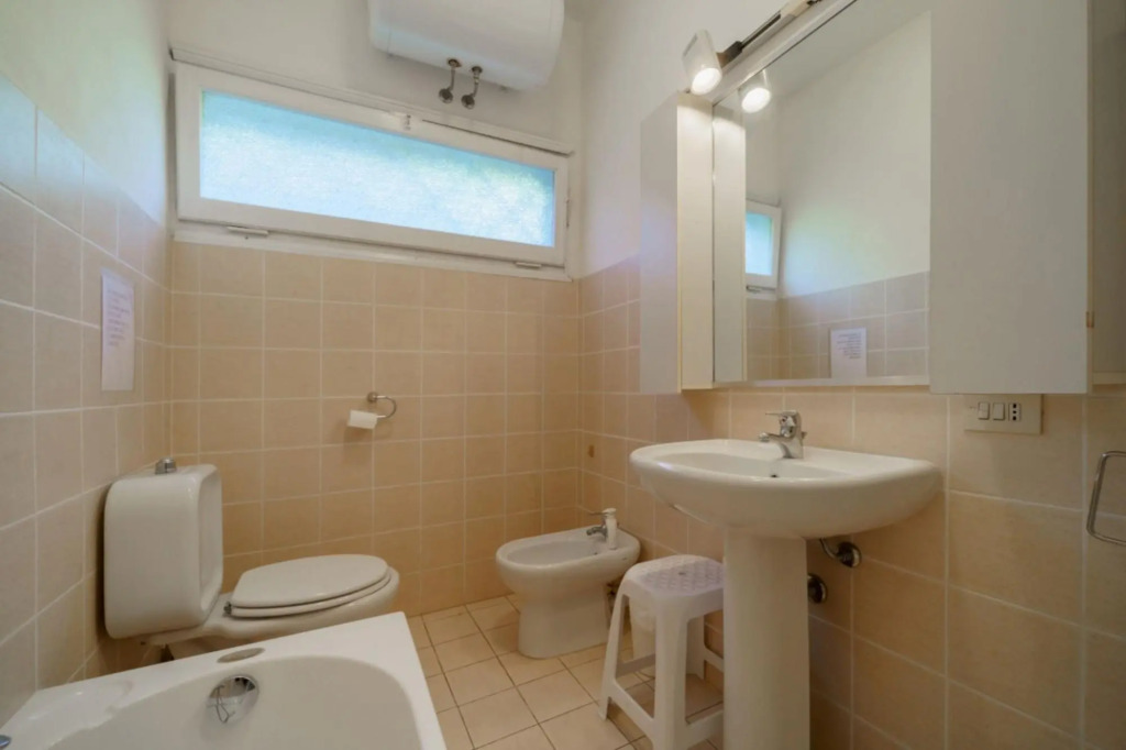 Rustic Villetta Le Grotte sleeps 8 comfortably with a view of the bay of Portoferraio-VILLETTA LE GROTTE