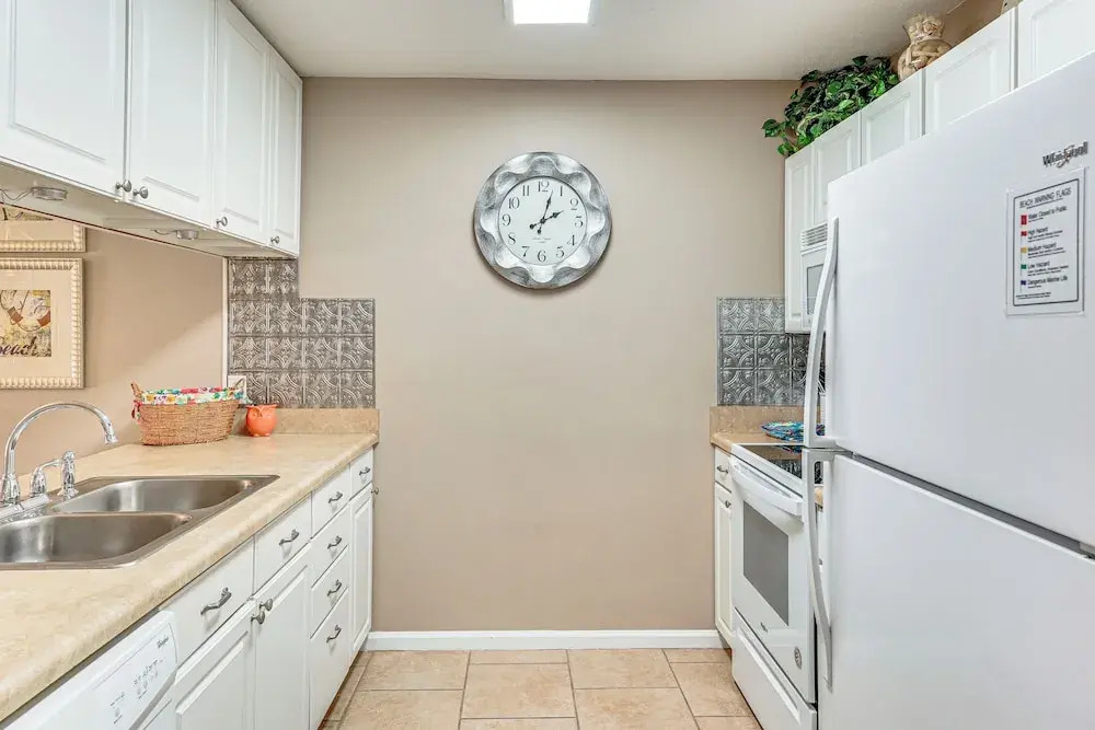Walk to Beach: PCB Gem w/ Community Pool Access!
