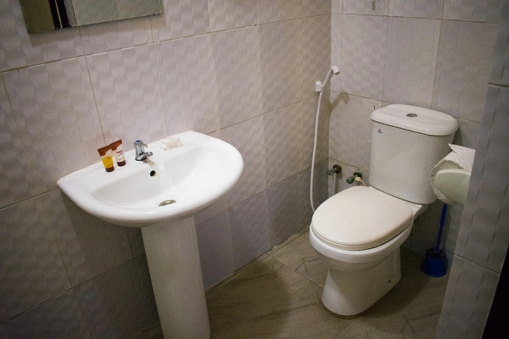 Отель Esporta Suites Agidingbi