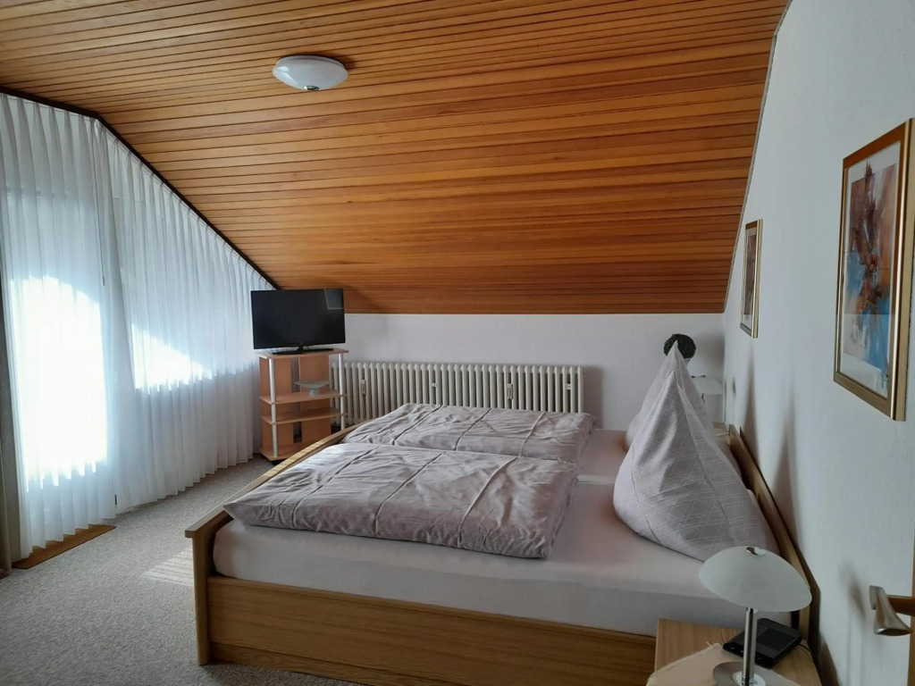 Ferienwohnung und Gästezimmer Iburgblick