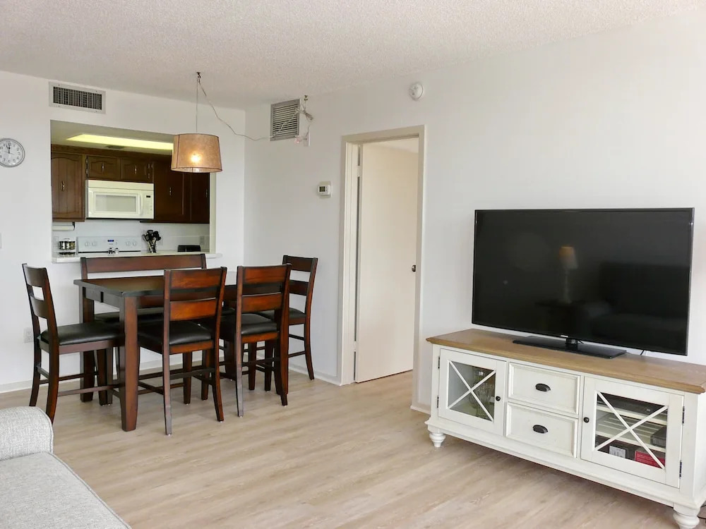 Inviting Beachfront Condo With Large Balcony and Pool