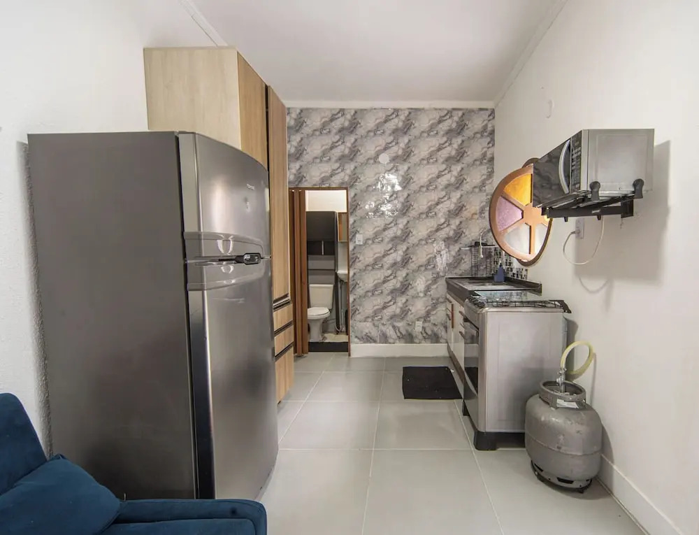 Casa com Piscina e Churrasqueira a 220 m da Praia