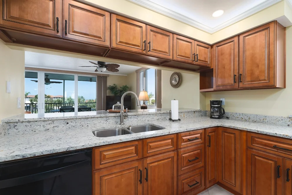 Immaculate Gated Community Condo - Just Across The Street From The Beach! 2 Bedroom Condo by RedAwning