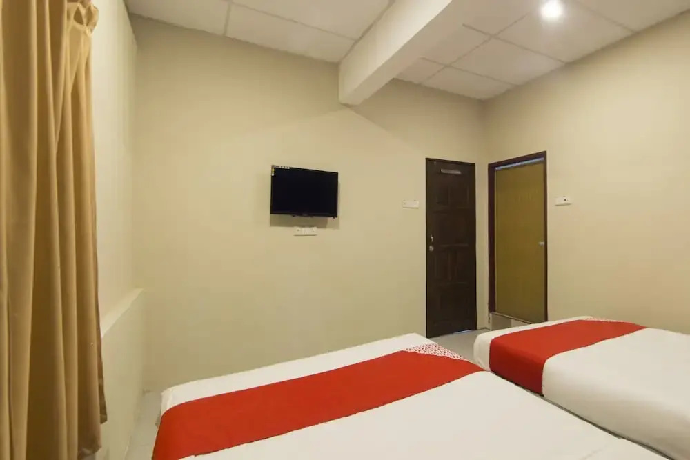 SPOT ON 89861 Man Hotel