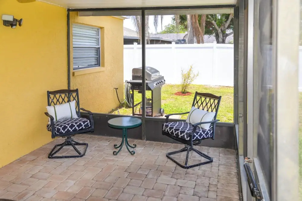 Lanai & Pond at Tranquil Bradenton Retreat!