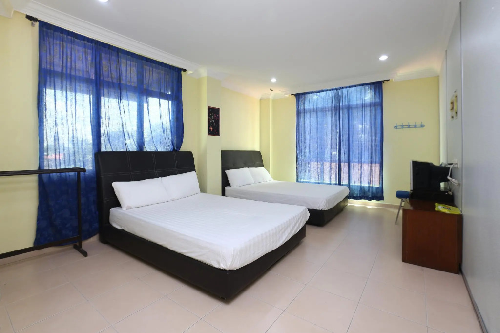 SPOT ON 89857 Azra Inn Rumah Tumpangan
