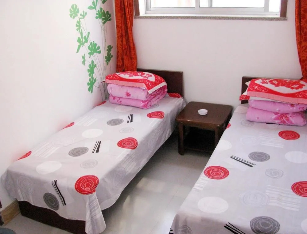 Rongjun Yujiale Hotel(蓬莱荣君渔家乐)