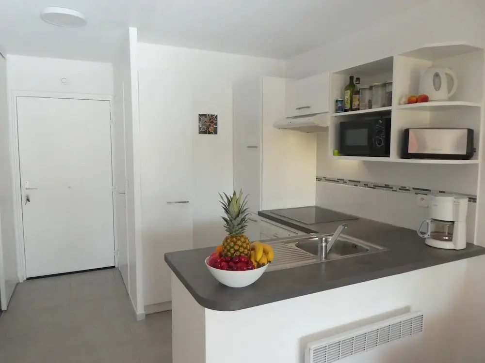 T2 climatisé avec piscine et parking