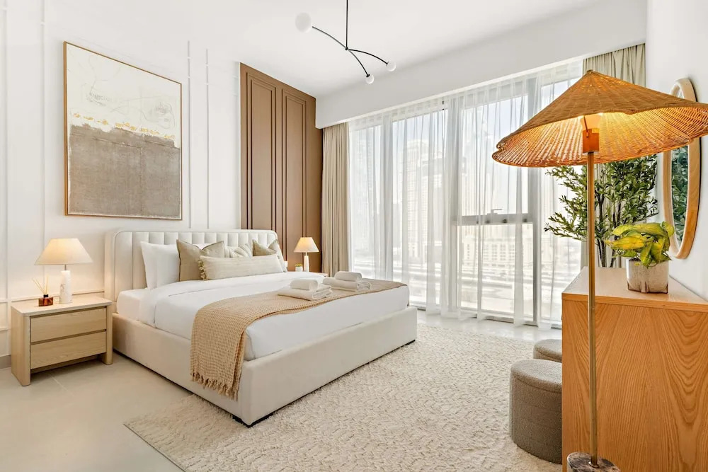 Bright 1BR Escape w Balcony Building Pool