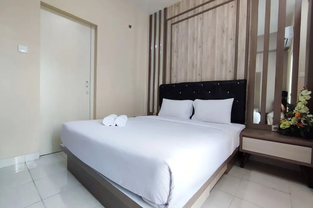 Homey 1BR without Living Room at Amartha View Apartment By Travelio
