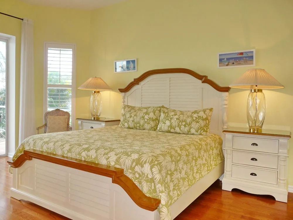 Waterfront home with views, pool and walk to beach