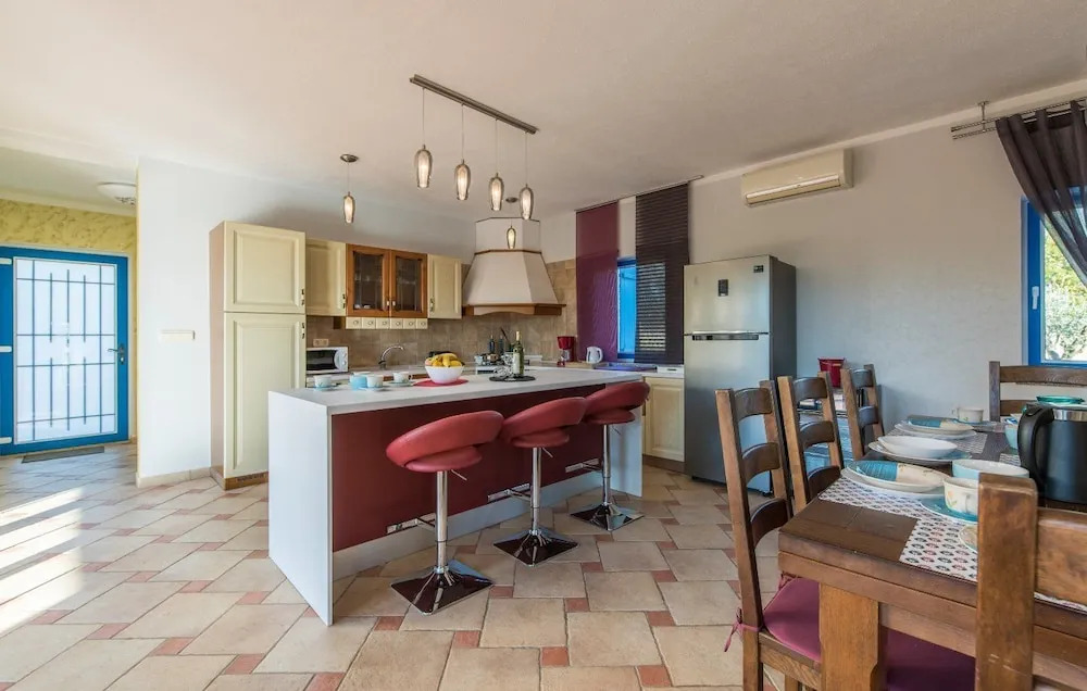 Newly built stone villa Mia with garden and pool