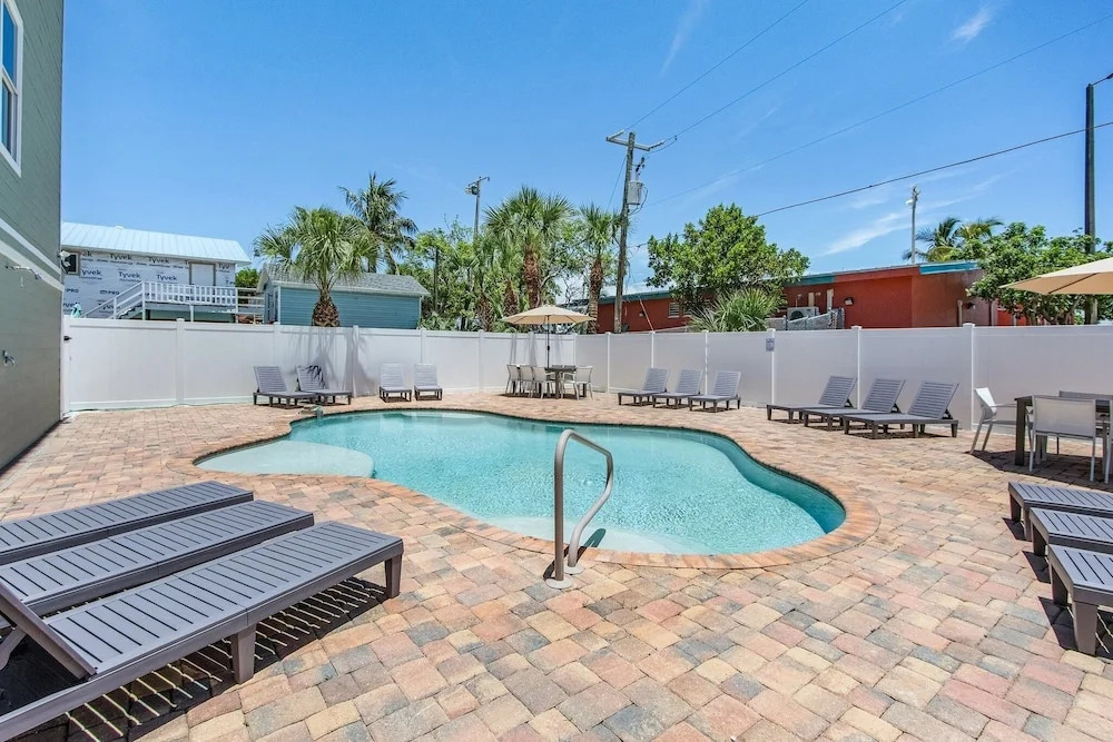 Coconut Sunsets A & B on Estero Blvd, 7 Bedroom Hom by RedAwning
